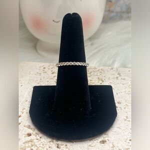 Cubic zirconia eternity band 10k yellow gold.